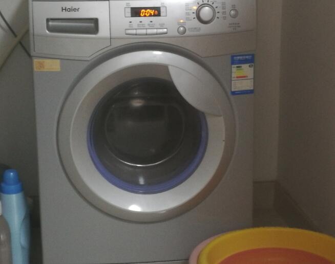 海尔全自动滚筒洗衣机脱水时噪音巨大怎么回事？怎么办？1