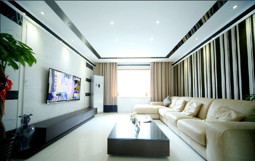 铜陵旺龙大市场现代简约大客厅米色真皮沙发条纹沙发背景墙白色瓷砖电视墙效果图