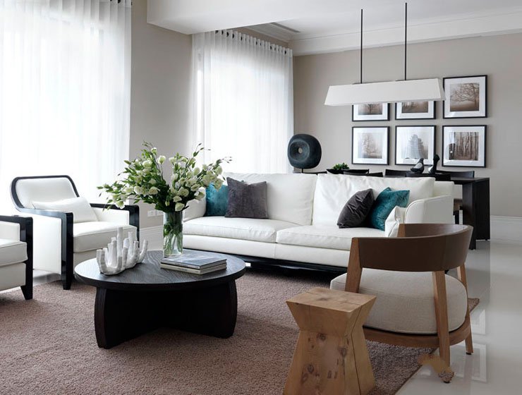 北欧宜家风格一字型白色沙发浅绒色地毯客厅装修效果图