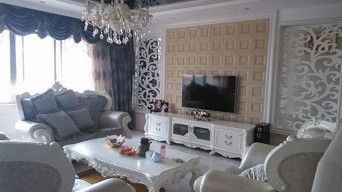 乳白色欧式u字型沙发屏风电视墙客厅装修效果图