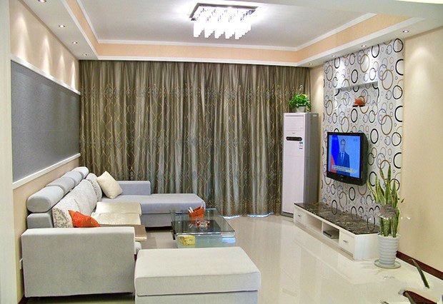 上海当代清水园一居室20平米现代简约风格圆圈电视背景墙客厅装修效果图