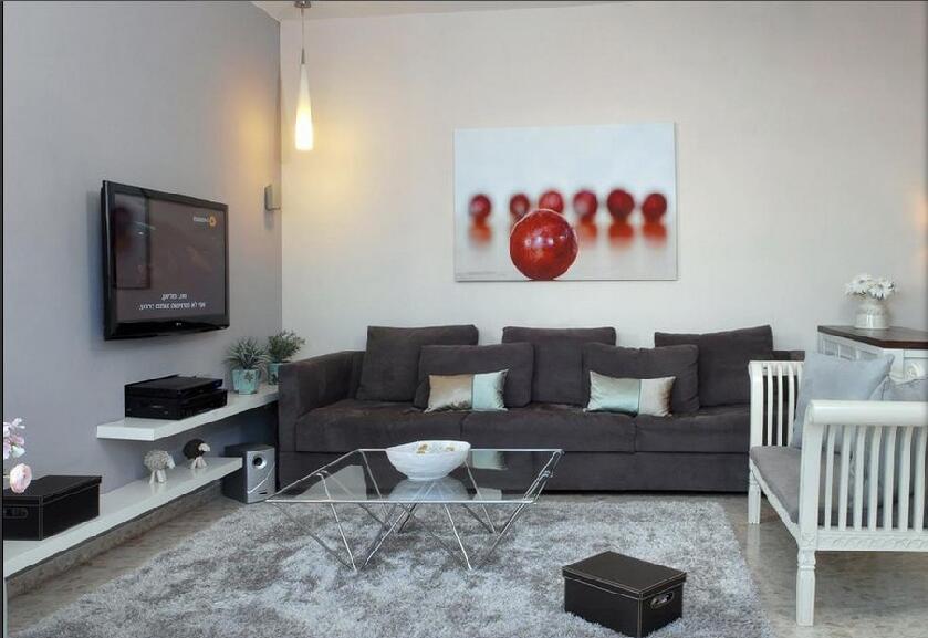 乌兰察布嘉苑小区-恩和路小户型客厅透明茶几3D壁画木质方沙发效果图